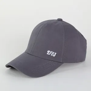 Dark grey ponytail sun hat with white embroidery and wide brim for UV protection