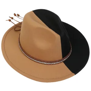 Detail of two-tone wool fedora with rhinestone studded leather band and bead tassels