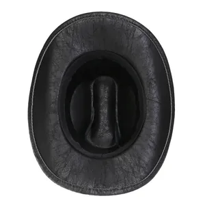 Top view of black cowboy hat showing vintage cracked leather texture and white stitching