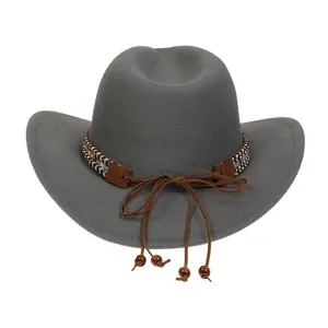 Detail of grey felt cowboy hat with bohemian woven band and wooden bead drawstring