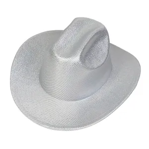 Close-up of the metallic silver texture and wide brim of the shiny western cowboy hat