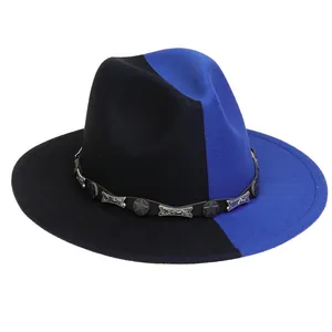 Détail d'un chapeau en laine bicolore avec bande décorative et boucle étoile