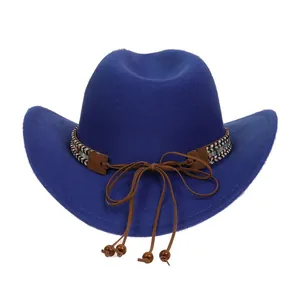 Detail of royal blue cowboy hat with ethnic patterned band and beaded leather ties