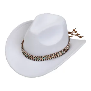Detail of white felt cowboy hat with bohemian woven band and wooden bead tassels