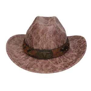 Detail of western cowboy hat featuring vintage cracked texture and metal bull skull buckle