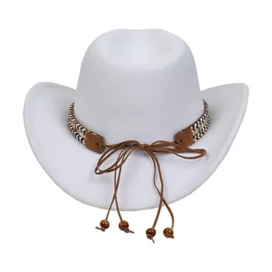 Close-up of white cowboy hat featuring ethnic woven band and brown beaded tassels