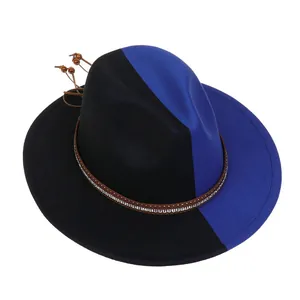Detail of two-tone wool felt fedora with a leather band and sparkling rhinestone accents