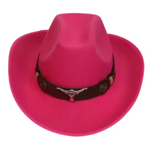 Detail of rose red cowboy hat with leather band and silver bull head metal ornament