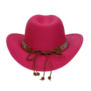 Detail of rose pink felt cowboy hat with colorful woven band and wooden beads decoration