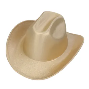 Detail of western cowboy hat with glossy metallic gold finish and classic rolled brim