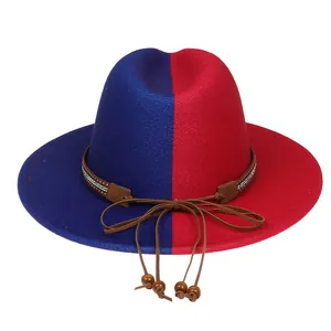 Detail of red and blue wool felt hat with brown leather band and beaded bow detail