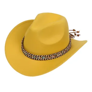 Detail of ginger western cowboy hat featuring ethnic woven band and beaded tassels