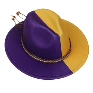 Detail of two-tone wool fedora with rhinestone-studded leather band and wooden bead tassel