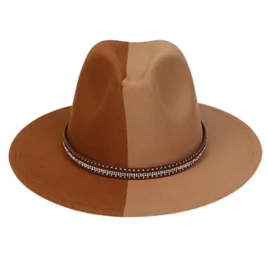 Detail of two-tone wool fedora featuring rhinestone band and metal stud embellishments