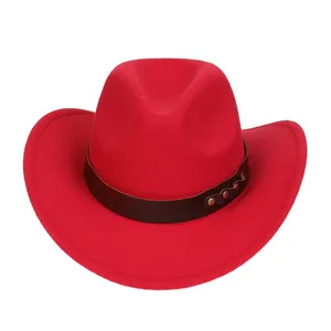 Close-up of red felt cowboy hat featuring brown leather band and bronze metal studs