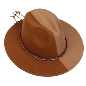 Detailed view of bicolor wool felt fedora with rhinestone leather band and bead tassels
