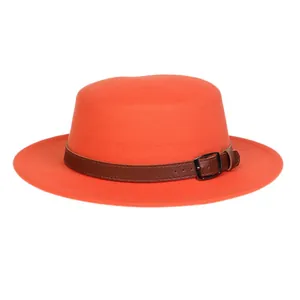 Orange felt fedora hat featuring a stylish brown leather band and metal buckle detail