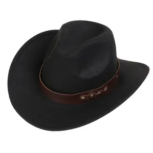 Detailed macro view of the black felt cowboy hat with brown studded leather hatband