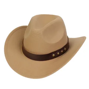Close-up of khaki denim cowboy hat with brown leather band and gold metal studs