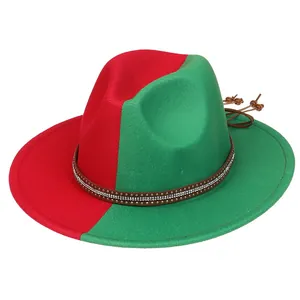 Detail of red and green two-tone fedora hat with rhinestone studded band and toggle cord