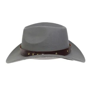 Close-up of a grey felt cowboy hat featuring a brown leather band and gold metal studs