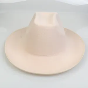 Classic cream wide brim wool felt cowboy hat with flat brim and fedora style crown