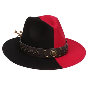 Detail of two-tone fedora hat showing leather band with studs and metal badge