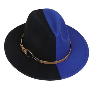 Détail de chapeau fedora bicolore noir et bleu roi en laine avec ruban en cuir marron