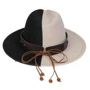 Detail of two-tone wool fedora with brown leather band, rivets, and wooden beads