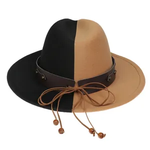 Detail of two-tone fedora hat with leather band, metal rivets and wooden beads