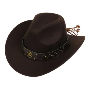Detail of dark brown felt cowboy hat with leather rivet band and embossed badge