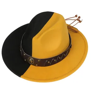 Detail of two-tone wool fedora with studded leather band and gold emblem badge