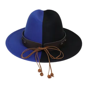 Detail view of two-tone blue and black wool felt fedora hat with brown leather band