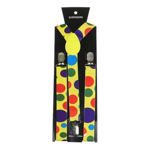 Detail of yellow suspenders with multi-color polka dots and silver metal clips
