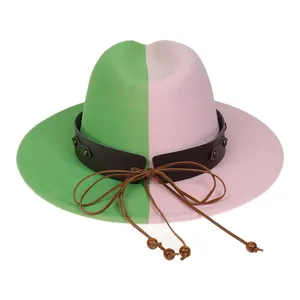 Detailed macro view of two-tone green and pink wool fedora with studded leather band