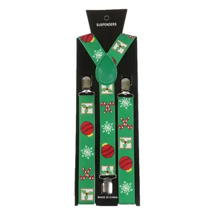 Close-up of festive Christmas jacquard suspenders with snowflake and candy cane patterns