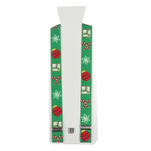 Detailed close-up of green festive suspenders with snowflake patterns and metal clips