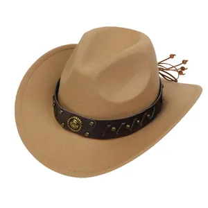 Detail of camel wool cowboy hat with brown leather band and golden horseshoe emblem