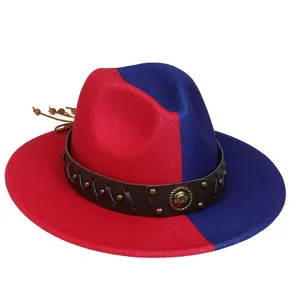 Detailed view of red and blue split felt fedora with studded leather band and charms