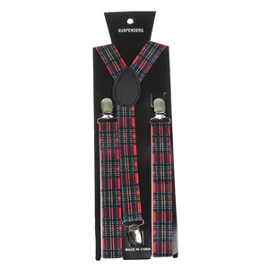 Close-up of red plaid suspenders with metal clips on black display card packaging
