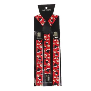 Red Christmas suspenders with festive penguin and dog patterns and silver metal clips