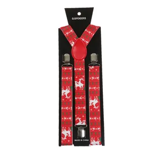 Close-up of red Christmas suspenders with reindeer patterns and silver metal clips