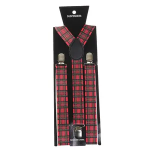Detail view of red and green plaid suspenders with silver metal clips on display card
