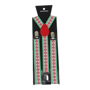 Detail of Christmas green suspenders with snowflake patterns and silver metal clips