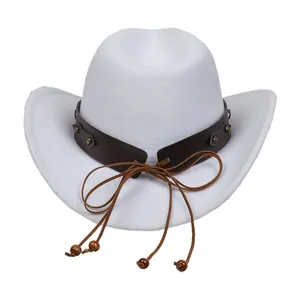 Detail of white felt cowboy hat featuring a brown leather band with rivets and wooden beads
