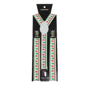 Detail of Christmas suspenders with reindeer patterns and silver metal clips on card
