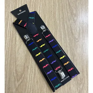 Close-up of black Y-back suspenders with colorful mustache patterns and silver metal clips