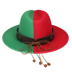 Detail of red and green two-tone fedora hat with studded leather band and wooden beads