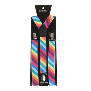 Close-up of rainbow striped Y-back elastic suspenders with metal clips on card packaging