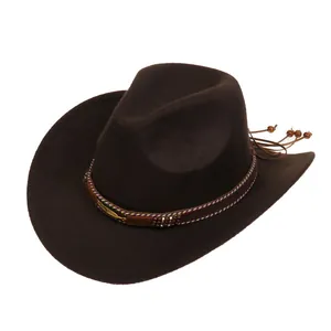Detail of western fedora hat featuring ethnic woven band and turquoise bead accents